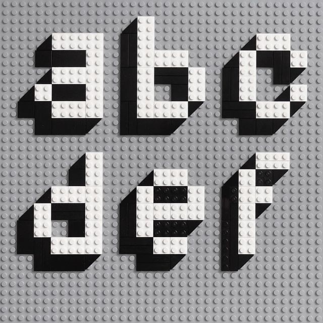 (Lowercase letters A, B, C, D, E, and F made of white Lego blocks on grey blocks.